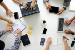 birds eye view of a meeting around a table