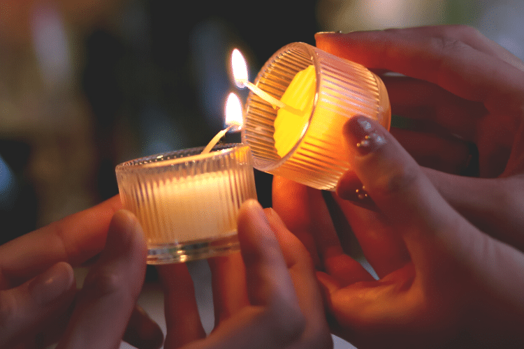 memorial candles being lit